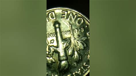 Fantastically rare variation that was never intended for release. . 1990 p dime extra leaf